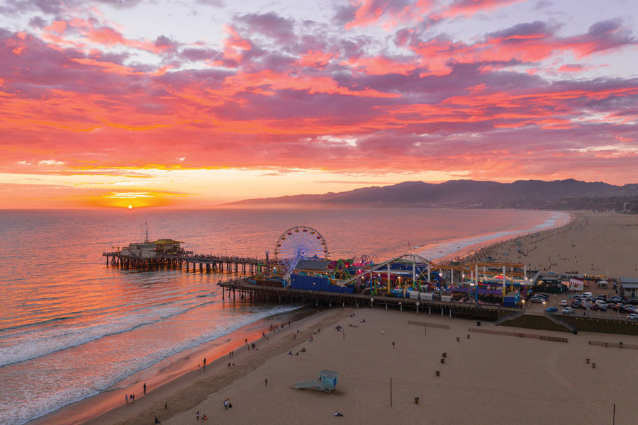 Pacific Park on the Santa Monica Pier at sunset.