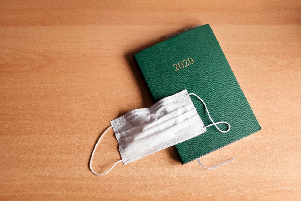 2020 planner notebook with a mask on top