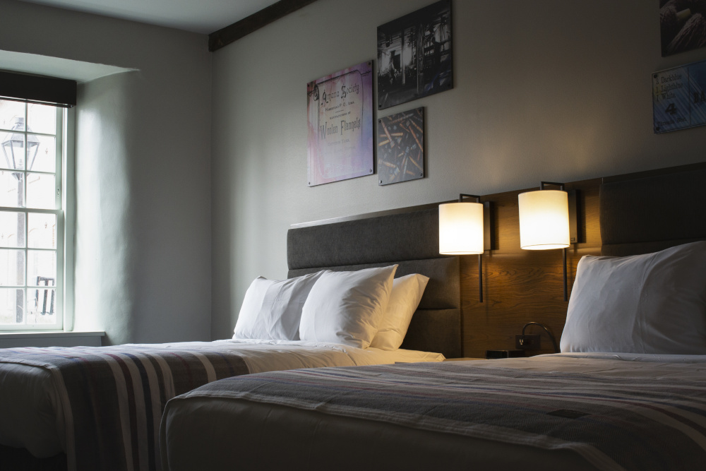 Photo: Relaxing guest rooms incorporate Amana woolens produced on site. Credit: Sara Montgomery