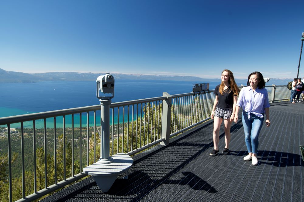 Two women walking on Heavenly Mountain's Observation Deck in South Tahoe
