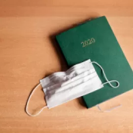 2020 planner notebook with a mask on top